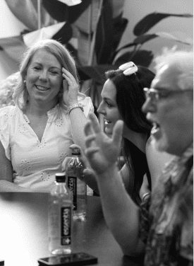 Darryll Stinson engaging with attendees at a professional event.