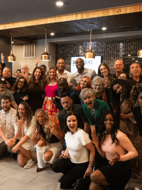 Community event with Darryll Stinson and diverse attendees.