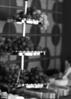 Event display with fruits and decorations by Darryll Stinson.